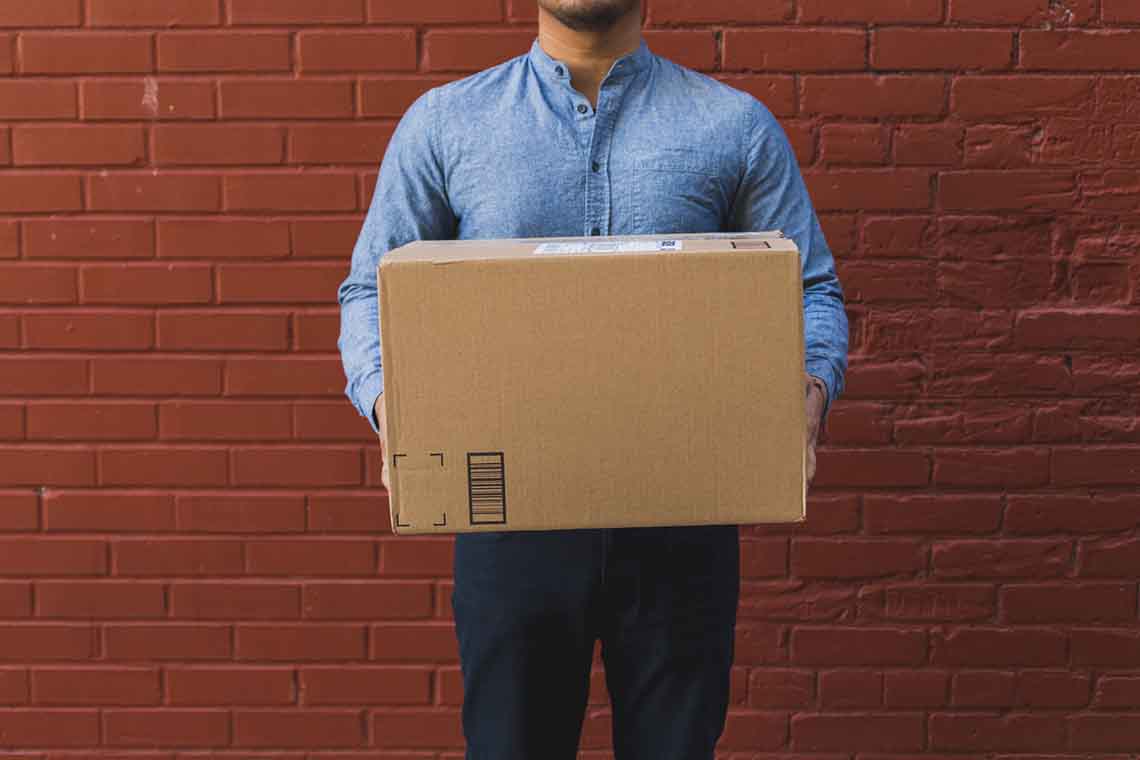 Person holding delivery package
